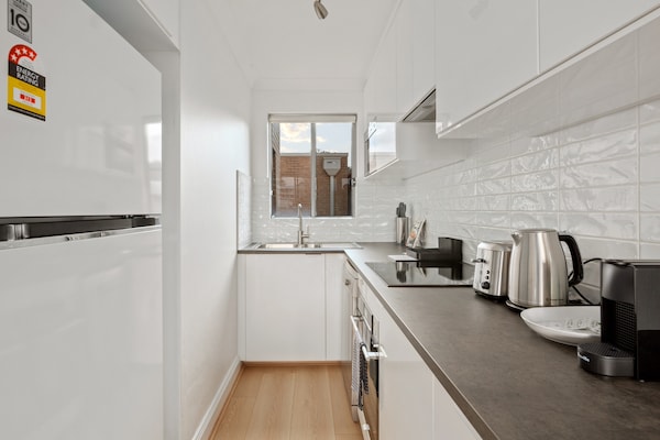 Foto van Stijlvol appartement met 1 slaapkamer vlakbij Manly Beach - Kitchen