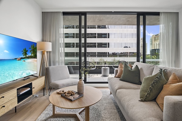 Foto van Gloednieuw appartement in Albert Park met zwembad en fitnessruimte. - LivingRoom