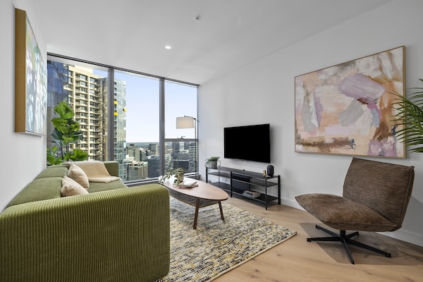 Foto van Skyline & Sea Luxe Verwarmd Zwembad, Fitnessruimte, Sauna, Stoomcabine - LivingRoom