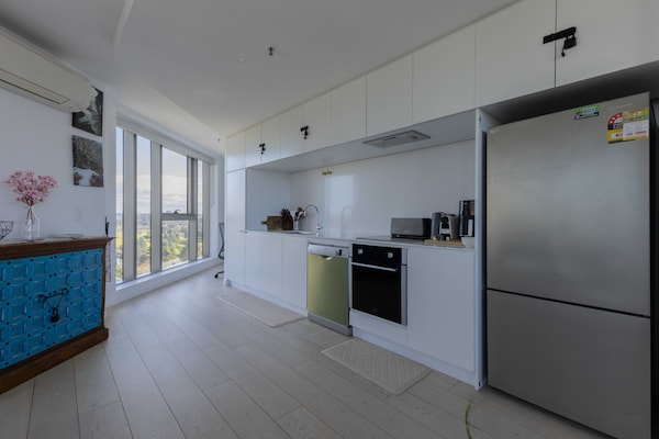Foto van Appartement met 2 slaapkamers en uitzicht op de skyline nabij Flemington - Kitchen