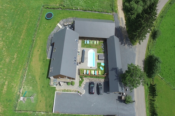 Foto van Villa met verwarmd buitenzwembad en sauna - Vakantiehuis in Manhay (lamormenil) - ExteriorSummer