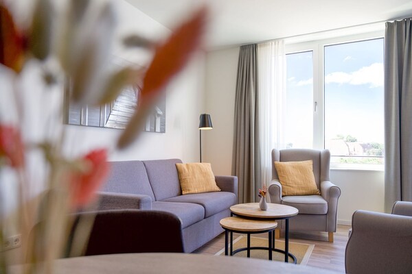 Foto van Parkside Nook met sauna - Vakantiehuis in Travemünde - LivingRoom