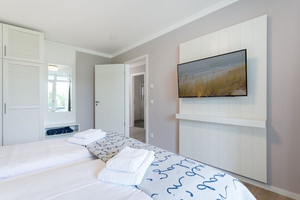 Foto van Vlak terrein op het westen nabij de kust - Vakantiehuis in Travemünde - BedRoom