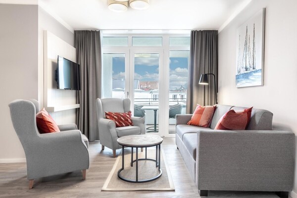 Foto van Ruim appartement met overdekt terras - Vakantiehuis in Travemünde - LivingRoom