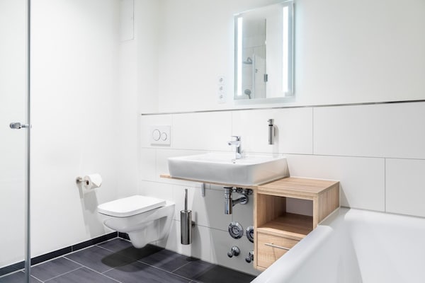 Foto van Ruim appartement met overdekt terras - Vakantiehuis in Travemünde - BathRoom