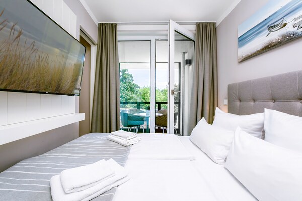 Foto van Oostappartement met gedeelde spa - Vakantiehuis in Travemünde - BedRoom