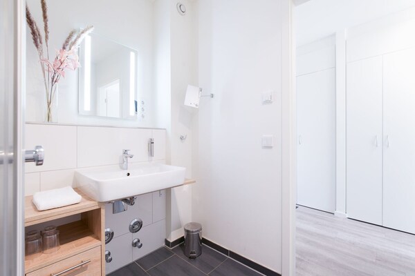 Foto van Rustplek met uitzicht op het park - Vakantiehuis in Travemünde - BathRoom