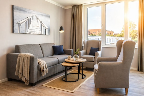 Foto van Travemuende Overdekte Balkon Suite - Vakantiehuis in Travemünde - LivingRoom