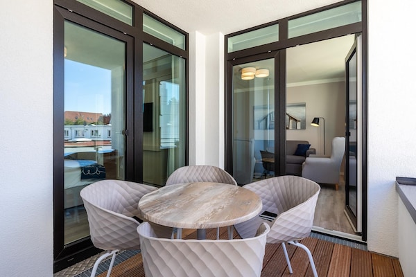 Foto van Travemuende Overdekte Balkon Suite - Vakantiehuis in Travemünde - TerraceBalcony