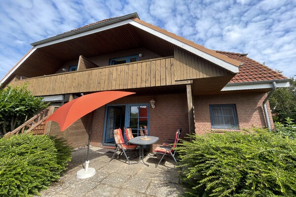 Foto van Gezellig vakantieappartement op Fehmarn - Vakantiehuis in Petersdorf - ExteriorSummer
