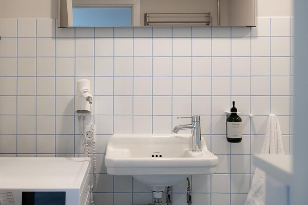 Foto van Appartement aan de kust in Amager met zwembad - Vakantiehuis in København - BathRoom