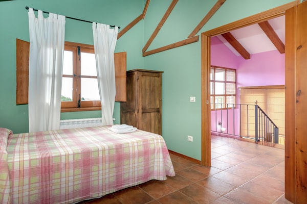 Foto van Geschakeld vakantiehuis naast een natuurplas in het dorpje Casas del Monte - BedRoom