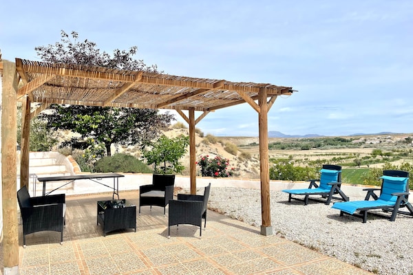 Foto van Grotwoning in Cúllar bij Tabernas Woestijn - Vakantiehuis in Cúllar - TerraceBalcony