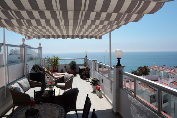 Foto van Penthouse in Nerja bij Balcón de Europa - Vakantiehuis in Nerja - terrace