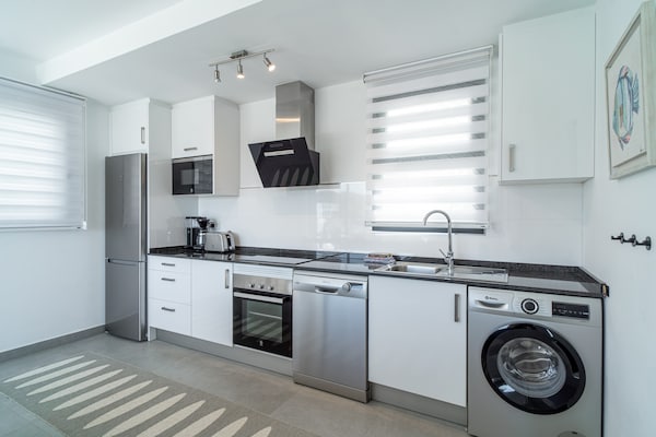 Foto van Penthouse in Nerja met Infinity Pool - Vakantiehuis in Nerja - Kitchen