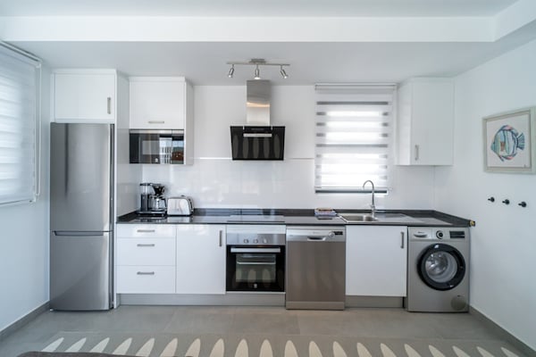 Foto van Penthouse in Nerja met Infinity Pool - Vakantiehuis in Nerja - Kitchen