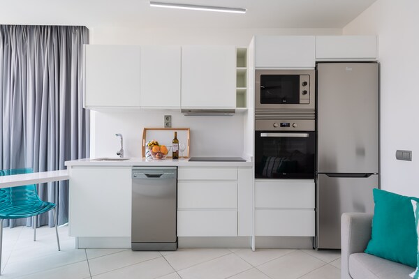 Foto van Appartement in Las Palmas in de buurt van Canteras - Kitchen