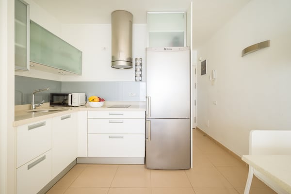 Foto van Strandappartement in Las Palmas met terras - Vakantiehuis in Las Palmas de Gran Canaria - Kitchen