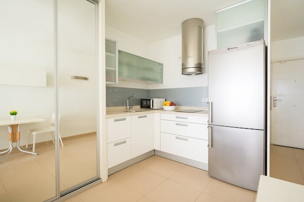 Foto van Strandappartement in Las Palmas met terras - Vakantiehuis in Las Palmas de Gran Canaria - Kitchen
