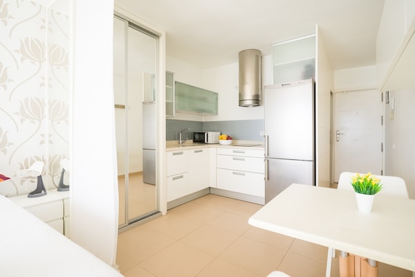 Foto van Strandappartement in Las Palmas met terras - Vakantiehuis in Las Palmas de Gran Canaria - Kitchen