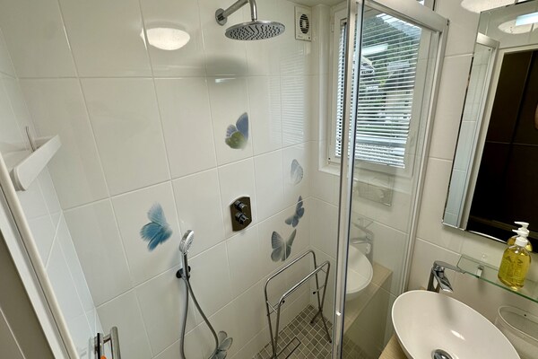 Foto van Elegant verblijf met 2 slaapkamers in Mont-Dore - Vakantiehuis in Mont-Dore - BathRoom