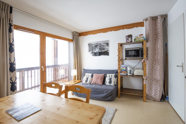 Foto van Appartement in Val Cenis met uitzicht op de bergen - LivingRoom