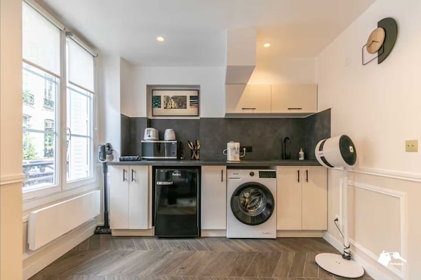 Foto van Luxe appartement met 1 slaapkamer en 4 zitplaatsen in het hart van Parijs. - Untagged