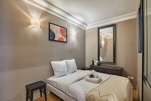 Foto van Charmant appartement in het centrum van Parijs door Studio Prestige - BedRoom