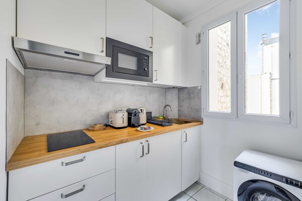Foto van Gezellig appartement 1 slaapkamer/2 badkamers - Parijs 14e arrondissement - Untagged