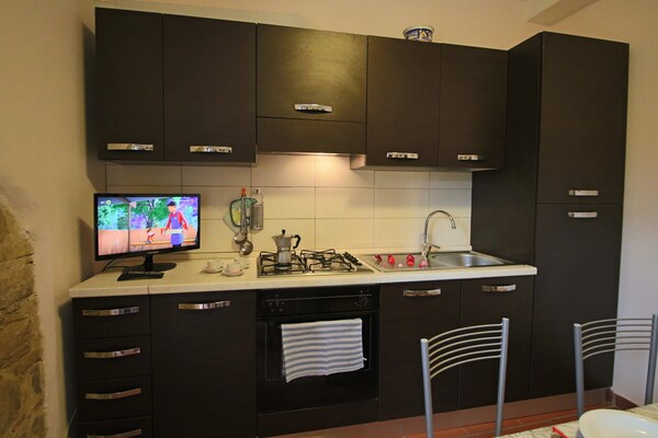 Foto van Cottage in Bettona met zwembad bij Assisi - Vakantiehuis in Bettona - Kitchen