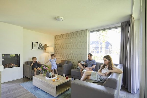 Foto van Bungalow in Limburg met Privé Speeltuin - Vakantiehuis in Roggel - LivingRoom