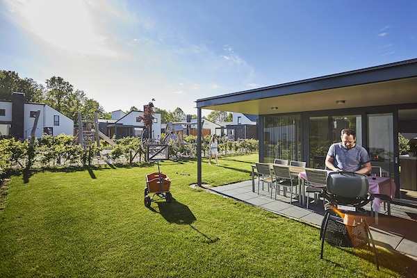Foto van Bungalow in Limburg met Privé Speeltuin - Vakantiehuis in Roggel - TerraceBalcony