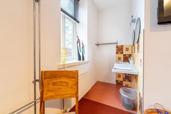 Foto van Fantastische groepsvilla op de Veluwe - Vakantiehuis in Teuge - BathRoom