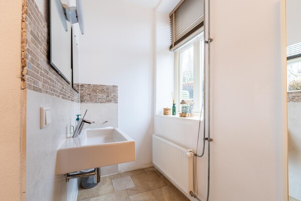 Foto van Fantastische groepsvilla op de Veluwe - Vakantiehuis in Teuge - BathRoom