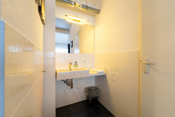 Foto van Fantastische groepsvilla op de Veluwe - Vakantiehuis in Teuge - BathRoom