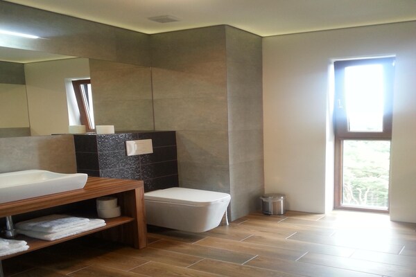 Foto van Appartement in Dziwnówek bij het Strand - Vakantiehuis in Dziwnówek - BathRoom