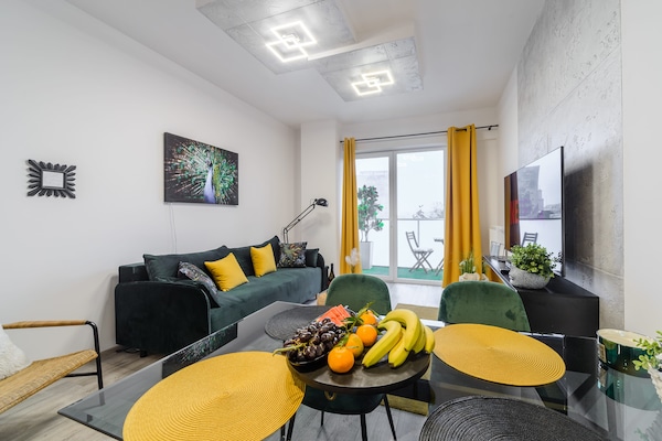 Foto van Stadsparadijs vlakbij Atlas Arena - Vakantiehuis in Łódź - LivingRoom