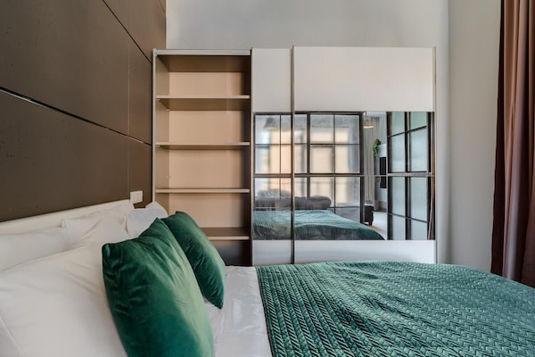 Foto van Loftappartement in een historische wijk - Vakantiehuis in Łódź - BedRoom