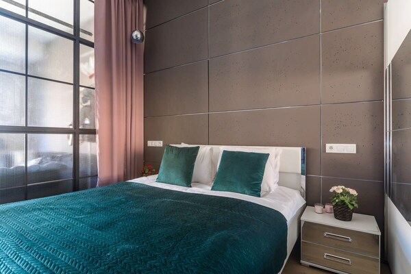Foto van Loftappartement in een historische wijk - Vakantiehuis in Łódź - BedRoom