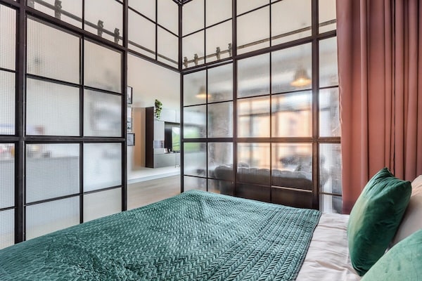 Foto van Loftappartement in een historische wijk - Vakantiehuis in Łódź - BedRoom