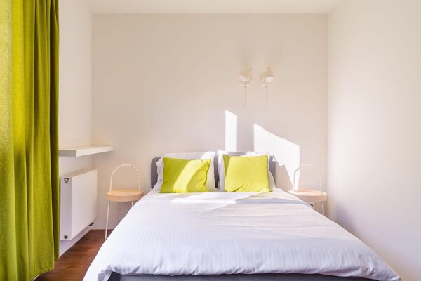 Foto van Loft in het historische Scheibler-gebied - Vakantiehuis in Łódź - BedRoom