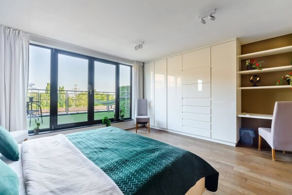Foto van Loft in het historische Scheibler-gebied - Vakantiehuis in Łódź - BedRoom