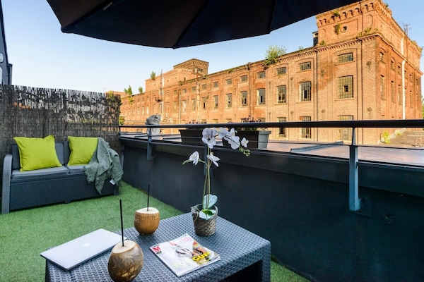 Foto van Loft in het historische Scheibler-gebied - Vakantiehuis in Łódź - TerraceBalcony