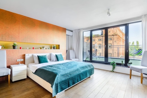 Foto van Loft in het historische Scheibler-gebied - Vakantiehuis in Łódź - BedRoom
