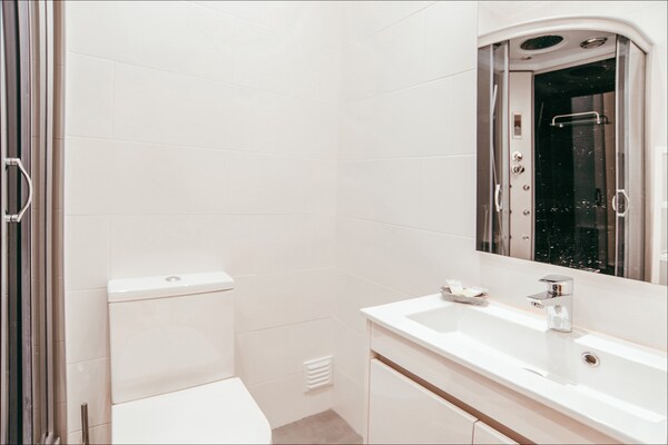 Foto van Retraite tussen Belém en Alcantara - Vakantiehuis in Lisboa ciudad - BathRoom
