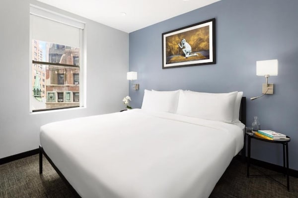 Foto van Toegankelijk comfort|Queensize bed |Times Square - Vakantiehuis in New York - BedRoom