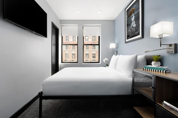 Foto van Toegankelijk comfort|Queensize bed |Times Square - Vakantiehuis in New York - BedRoom